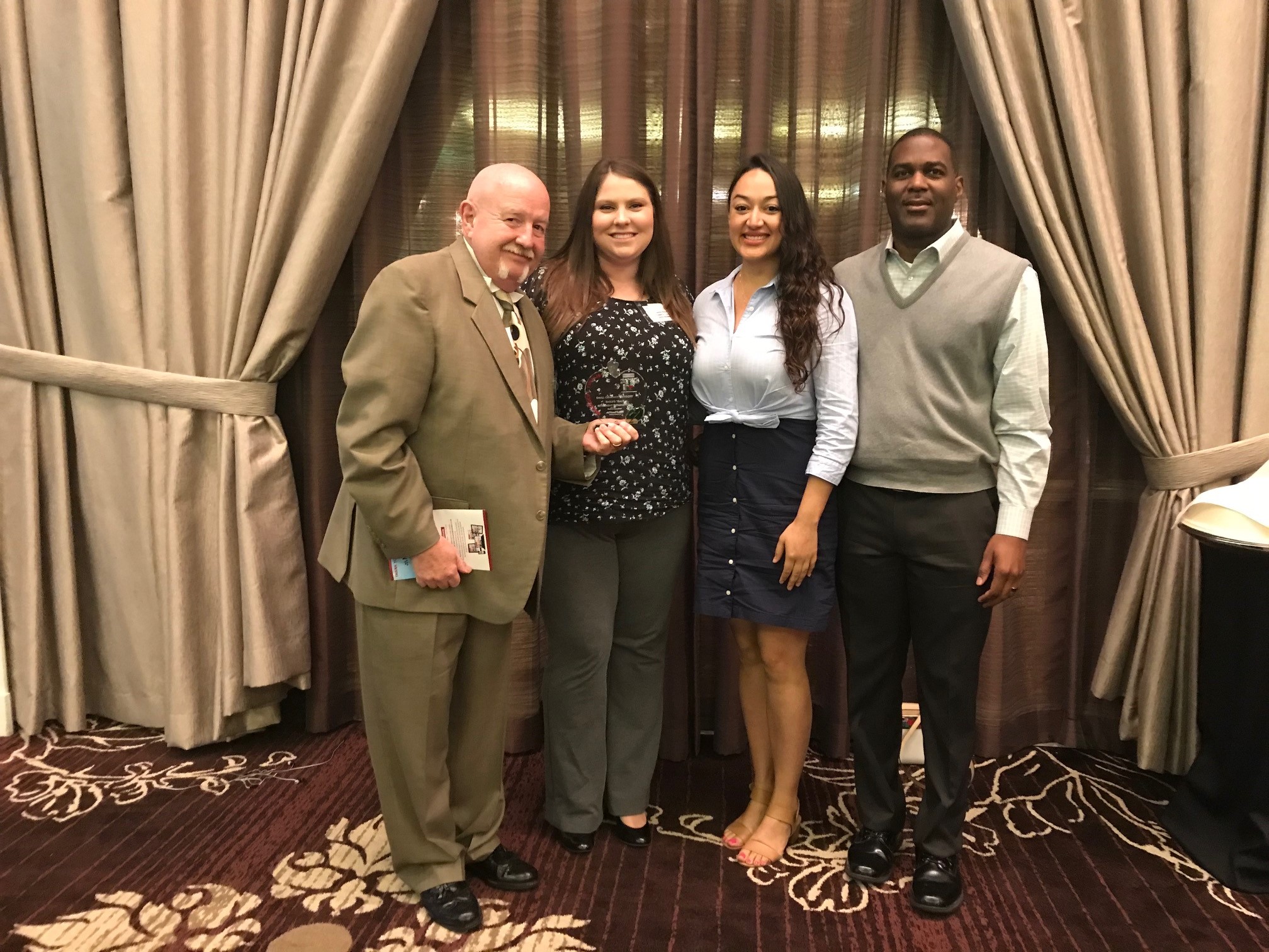 Members of the HR Department from Eagle's Trace accept the Healthiest Employer Award on May 17.