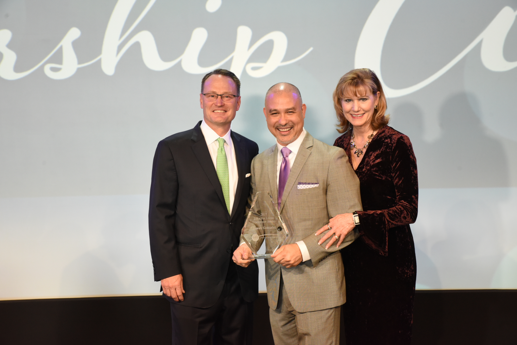 Left to right: Alan Butler, Chief Executive Officer, Erickson Living; Gonzalez and Debra Doyle, Chief Operating Officer, Erickson Living